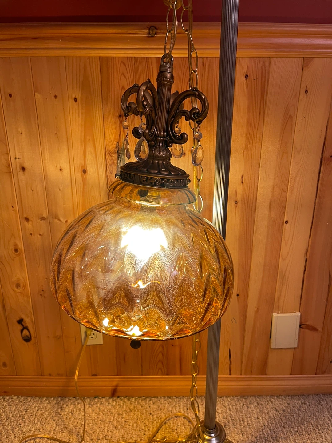 A large beautiful vintage amber glass swag light