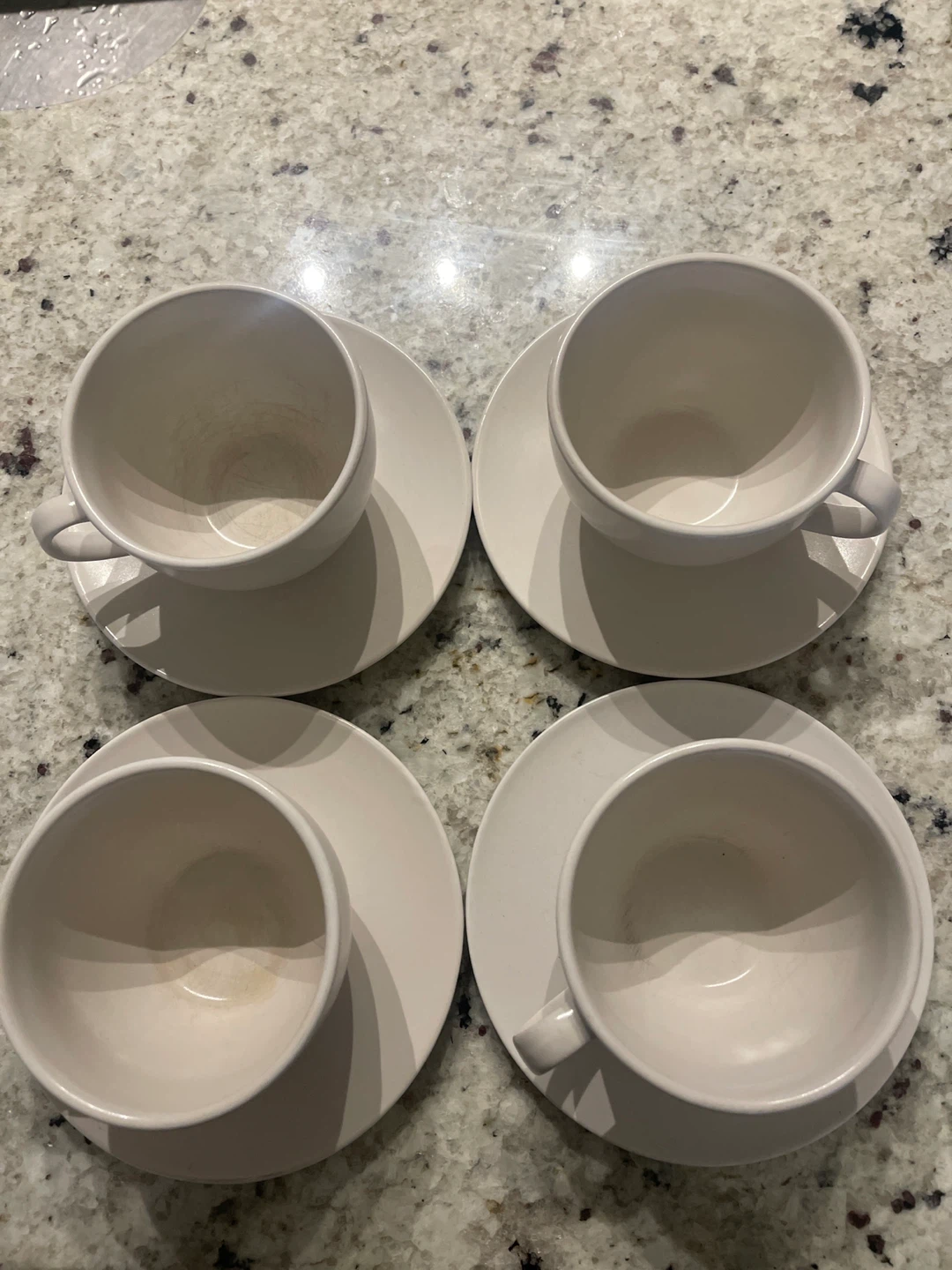 Set of 4 Cream Ceramic Tea Cups and Saucers