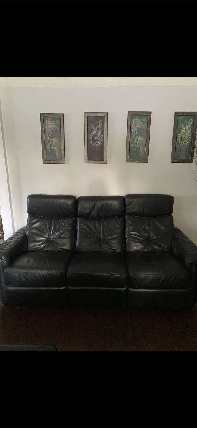 Three seater leather recliner small spot on left seat
