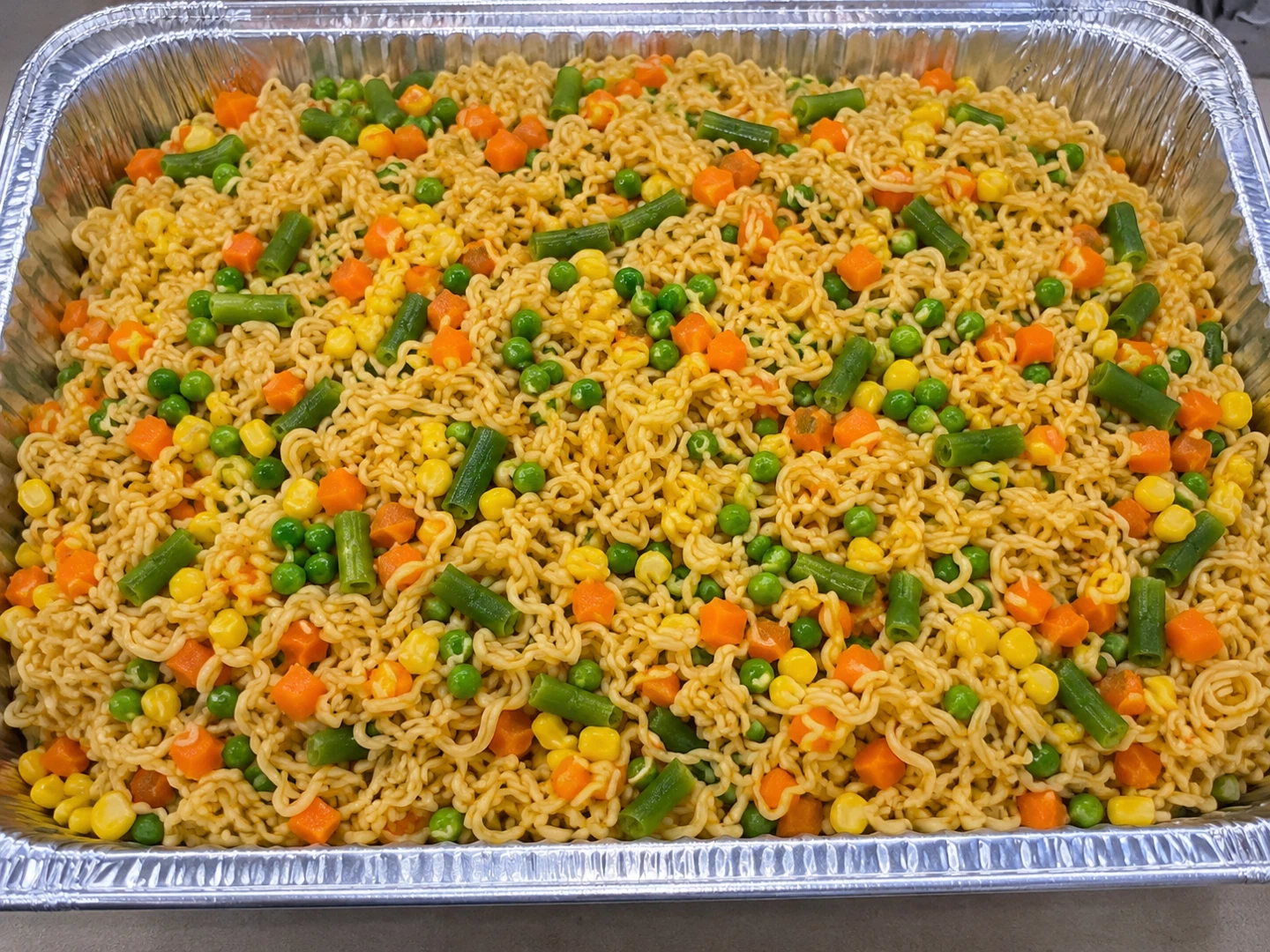 Trays of Jollof spaghetti and stir fried noodles available - photo 3