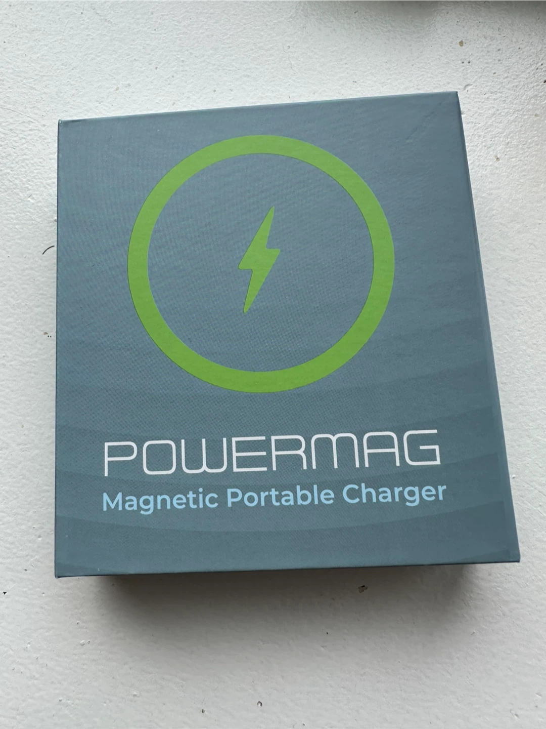 Magnetic portable phone charger