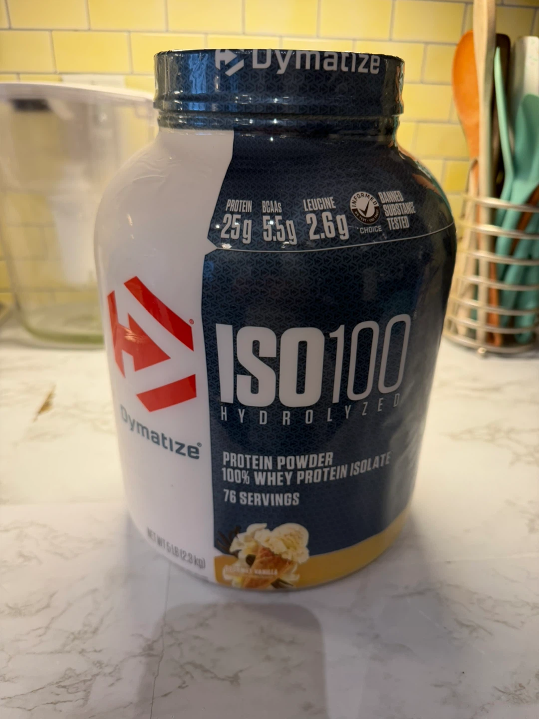 Dymatize ISO100 hydrolyzed protein powder in gourmet
