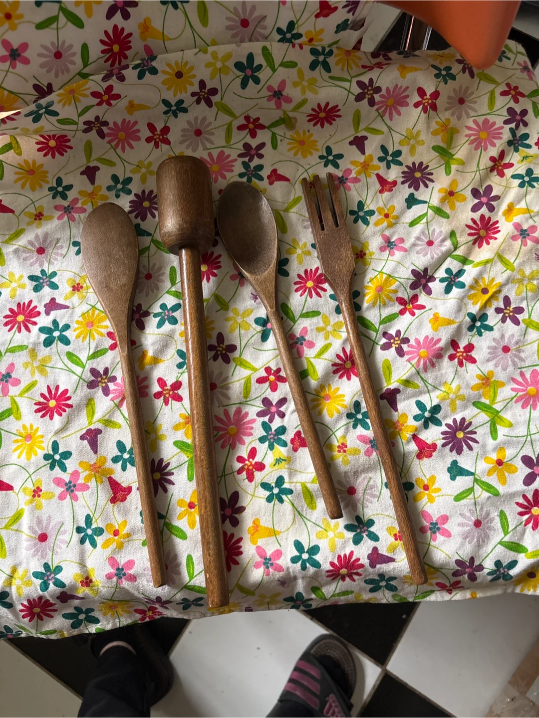 Set of four wooden kitchen utensils