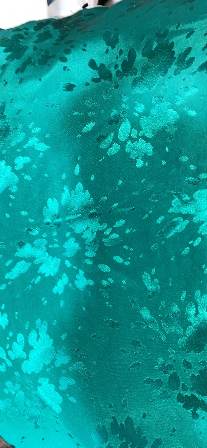 Teal patterned fabric. 84 x 46 in