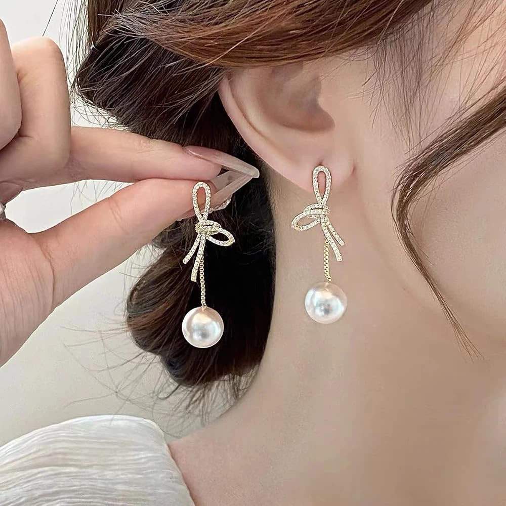 Crystal bow and pearl drop earrings - photo 2
