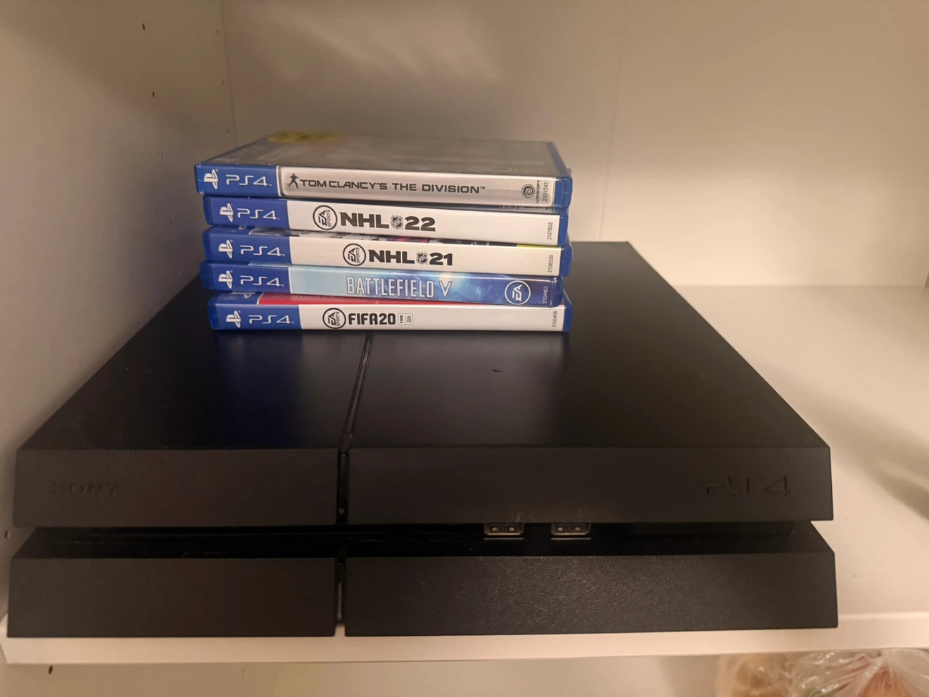 Sony PlayStation 4 Console with 2 Controllers and 5 Games