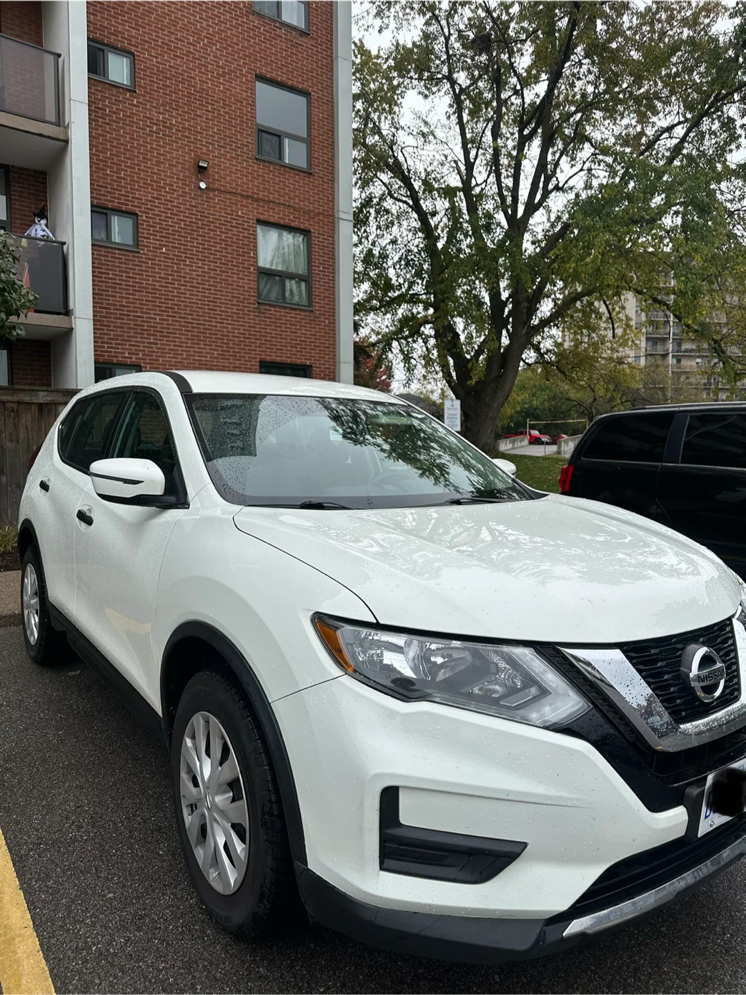 White Nissan Rogue SUV