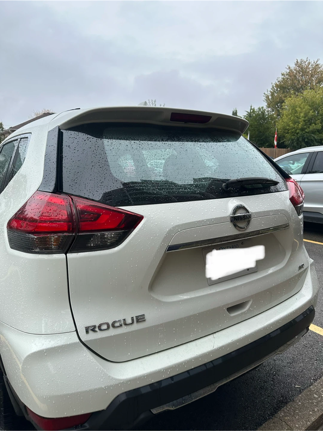 White Nissan Rogue SUV - photo 3