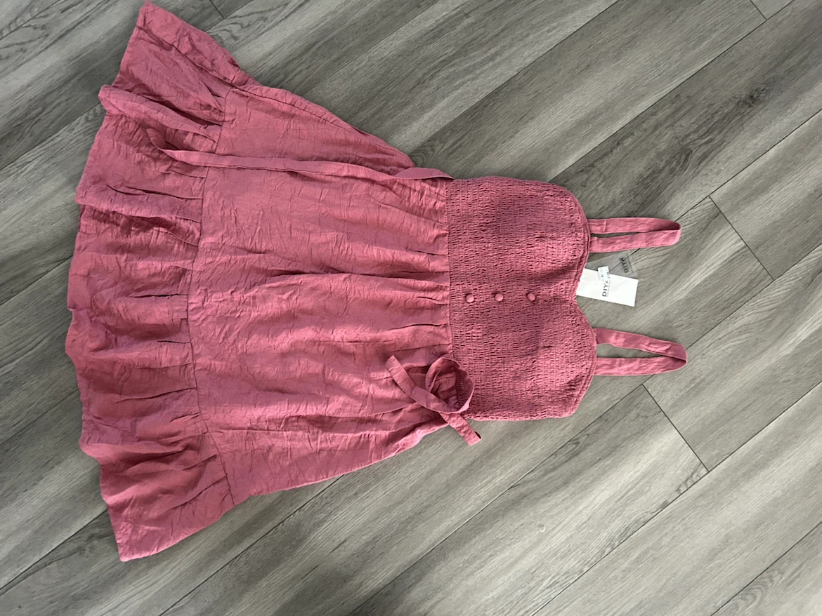Three girls' dresses