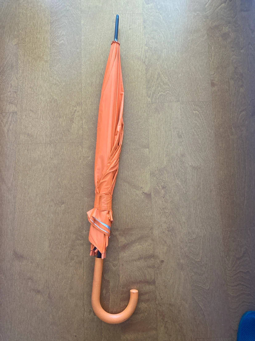 Orange hook-handle umbrella