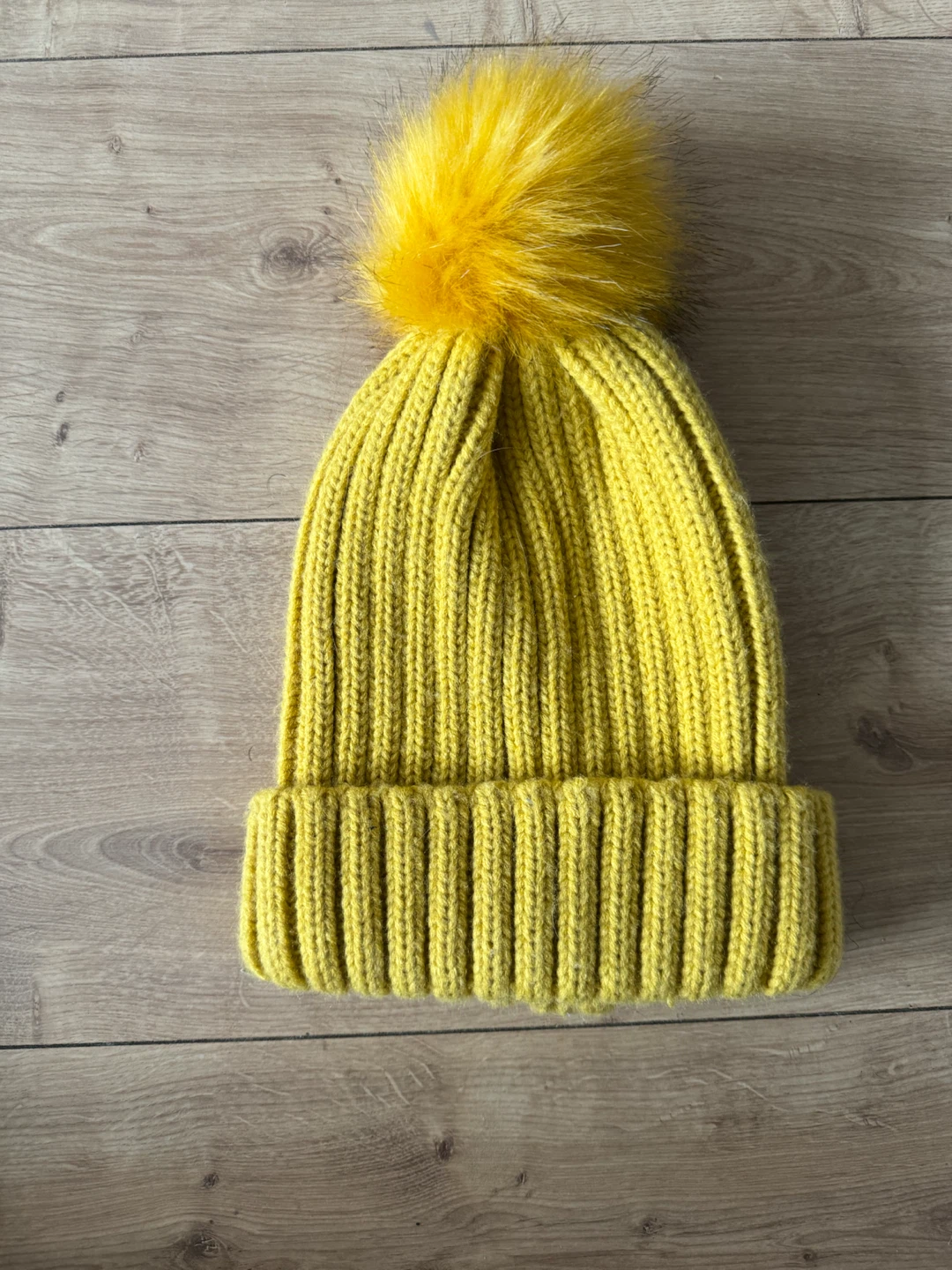 Yellow knit pom-pom beanie
