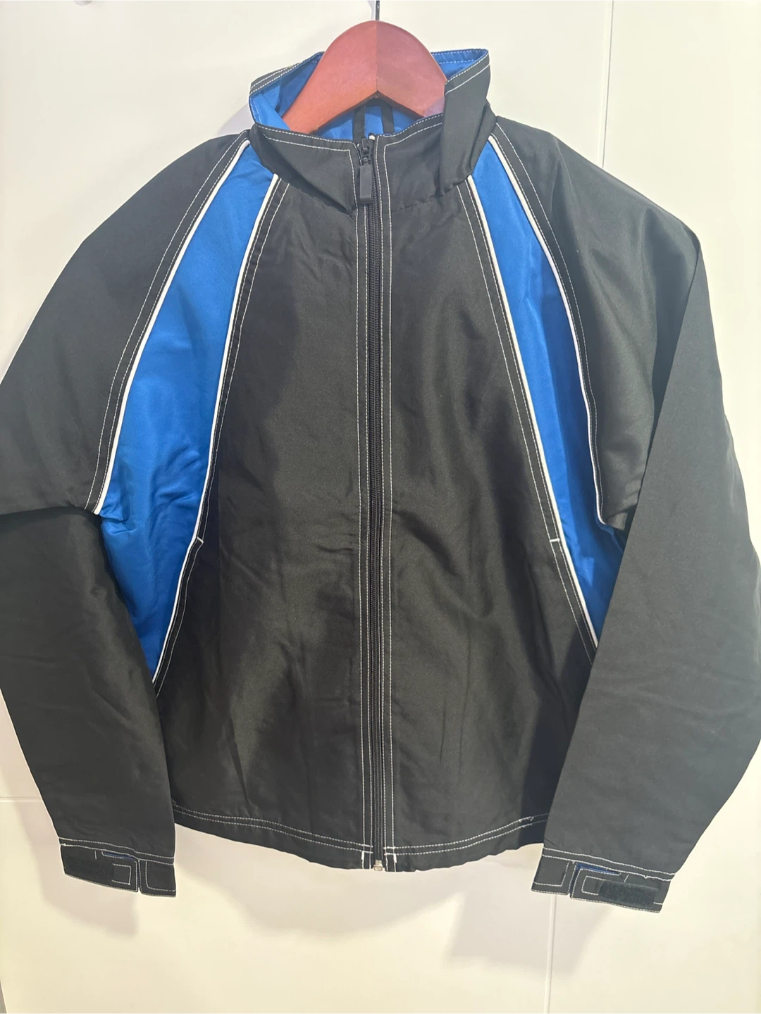 Black and blue zip-up jacket