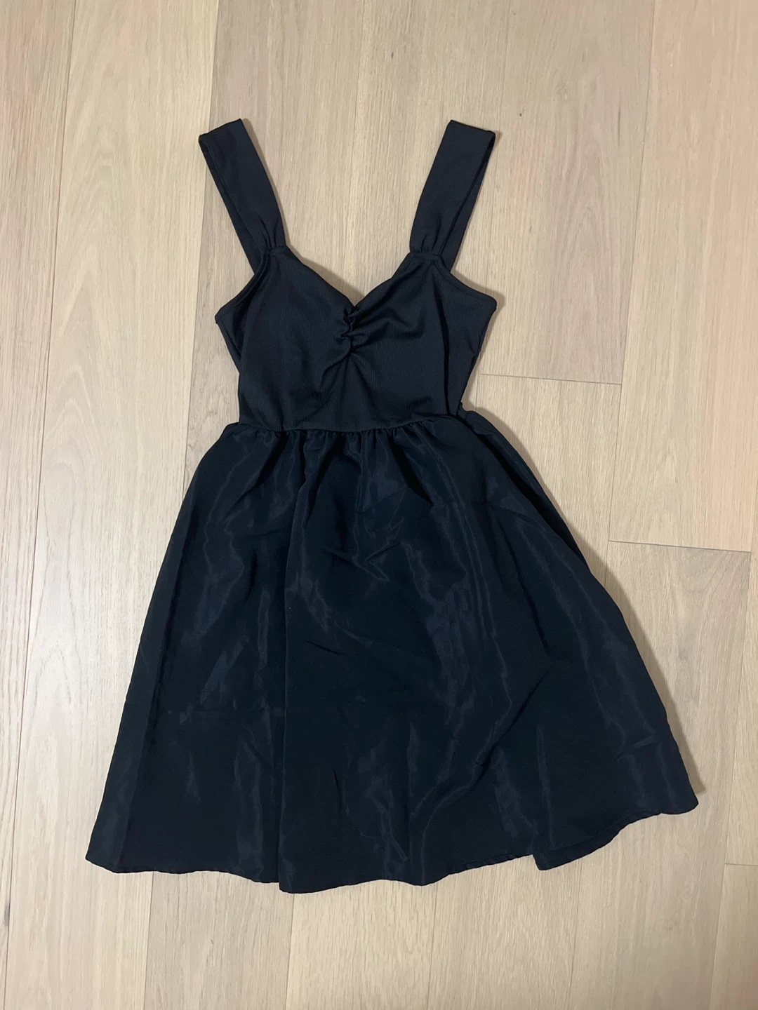 Black sleeveless mini dress