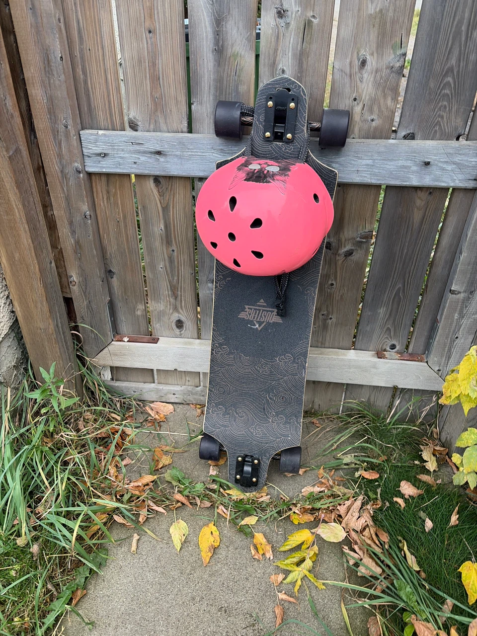 Dusters Longboard with Pink Helmet