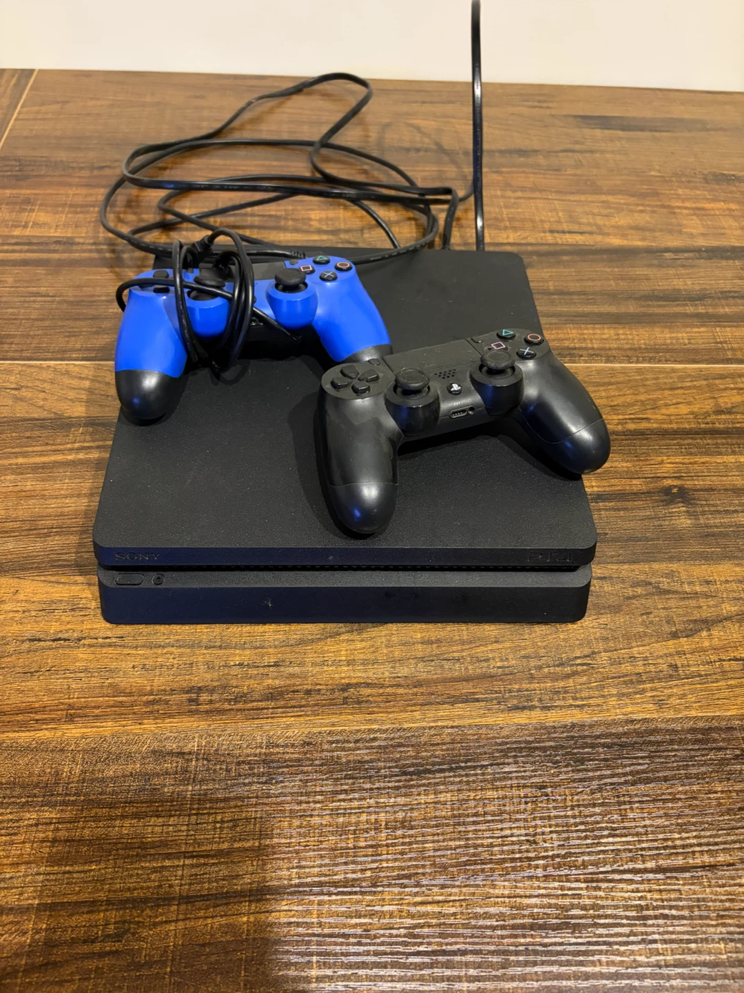Sony PlayStation 4 Slim Console with 2 Controllers