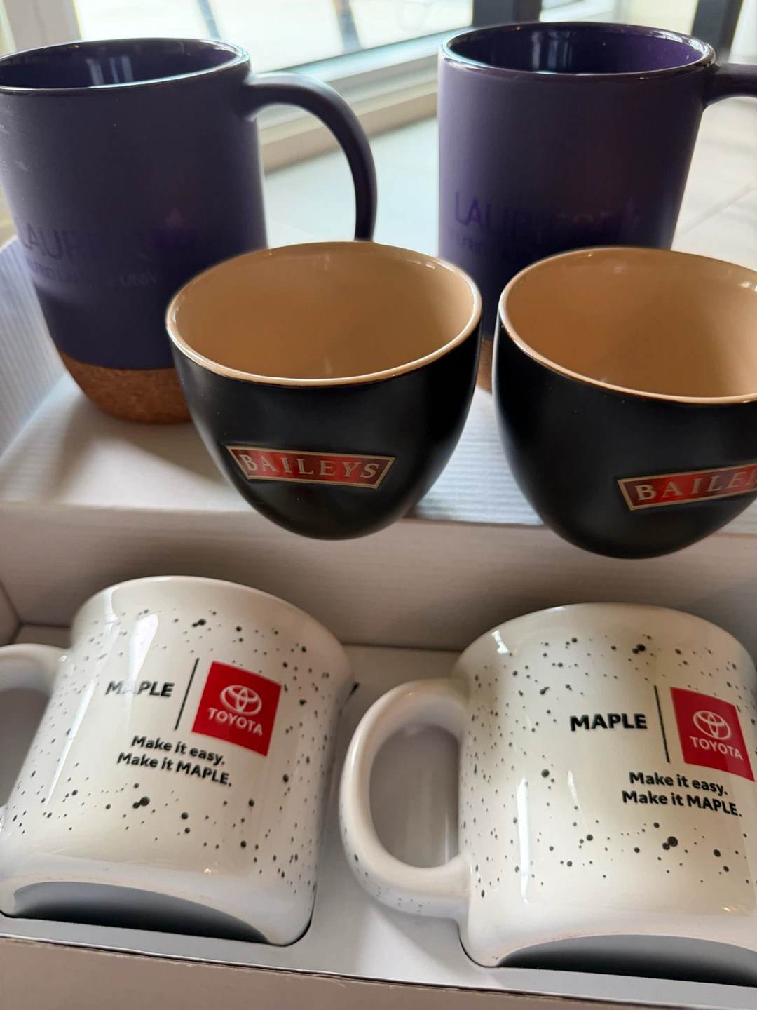Assorted branded ceramic mags all set