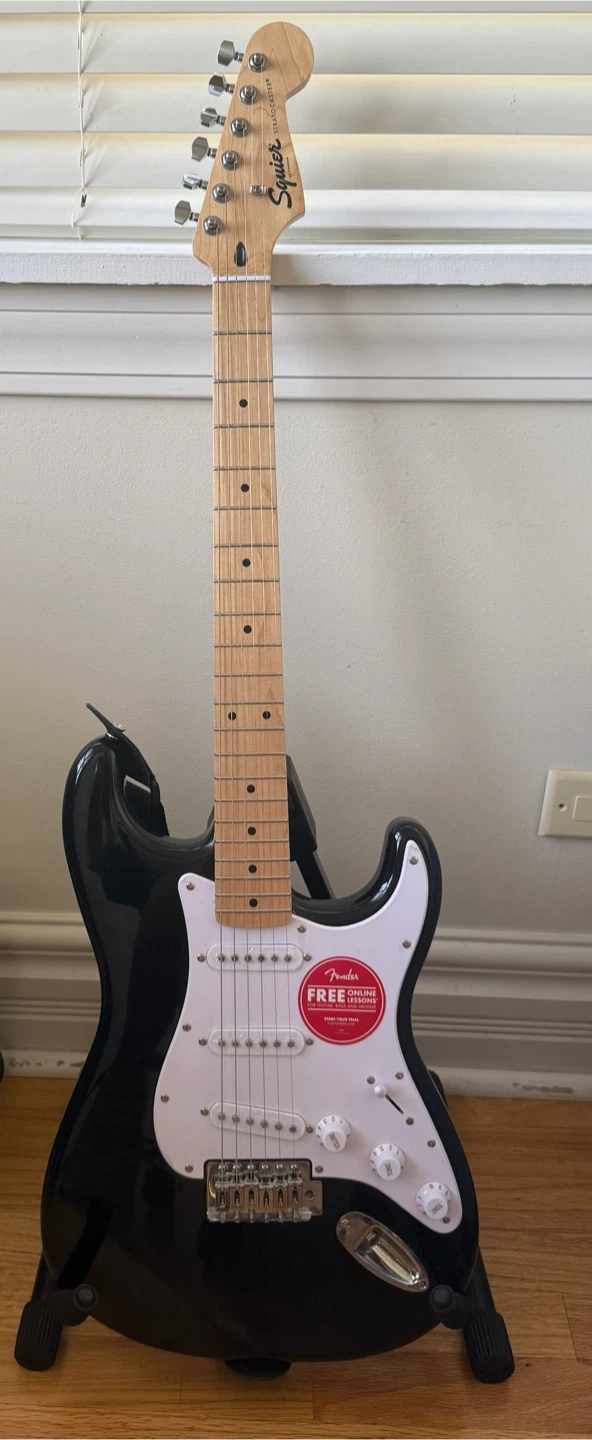 Squier Stratocaster Guitar with Amplifier