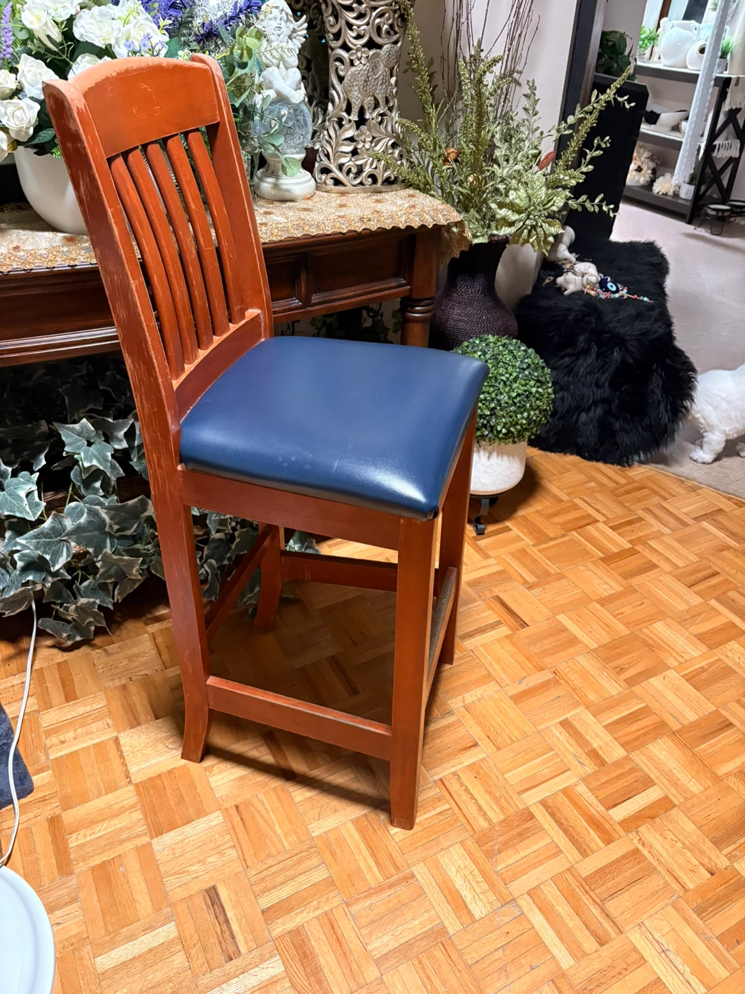 Wooden bar stool with navy blue seat