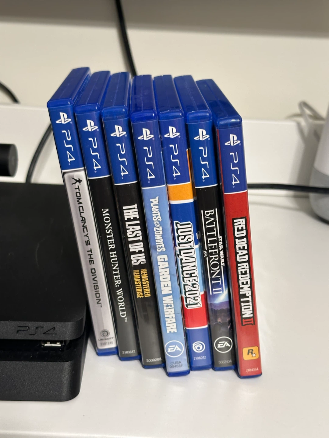 Sony PS4 Slim 500GB Bundle – 2 Controllers, Camera & 7 Games - photo 2