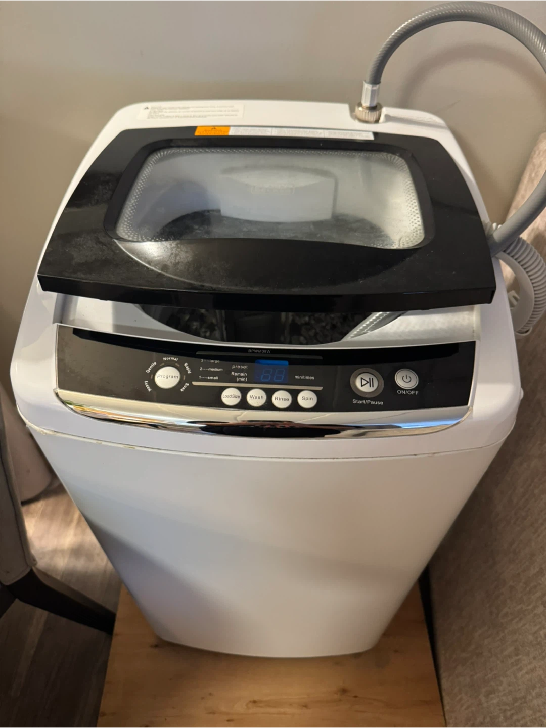 Apartment sized Black and Decker washer and dryer.