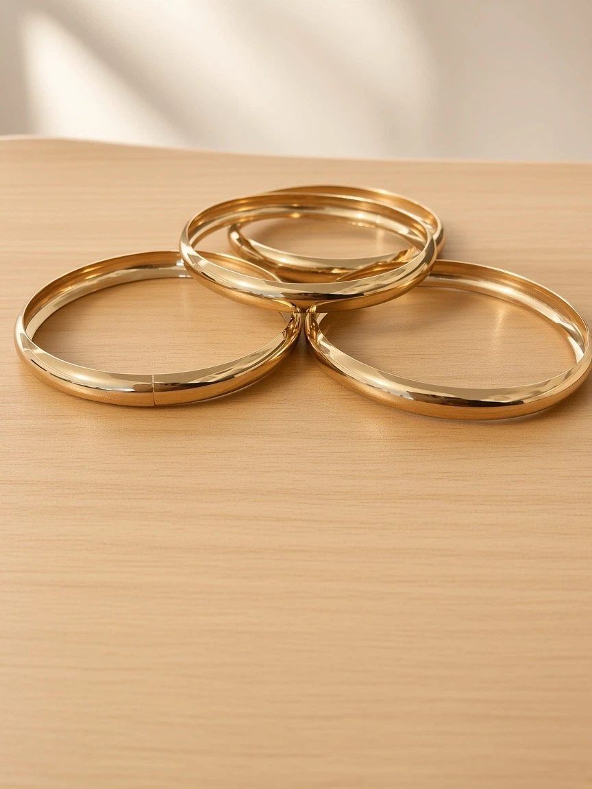 Set of Three Gold-Tone Bangle Bracelets