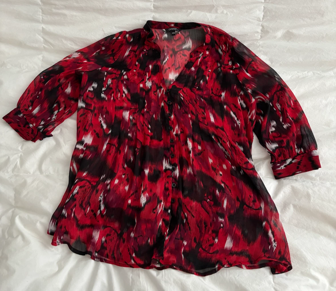 George red and black patterned blouse