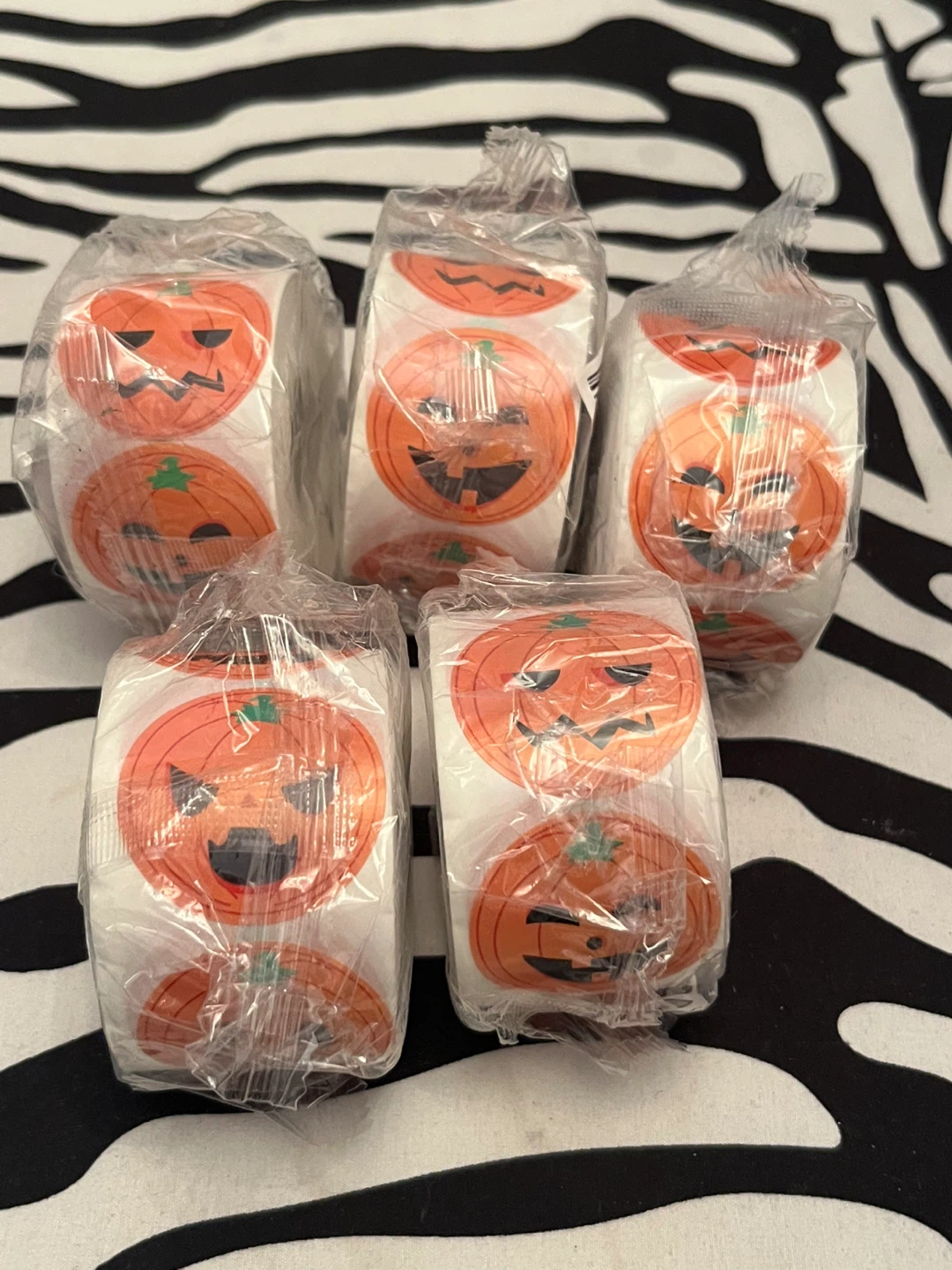 🎃 Rolls of 500 count jack-o’-lantern stickers $10 each roll 🎃