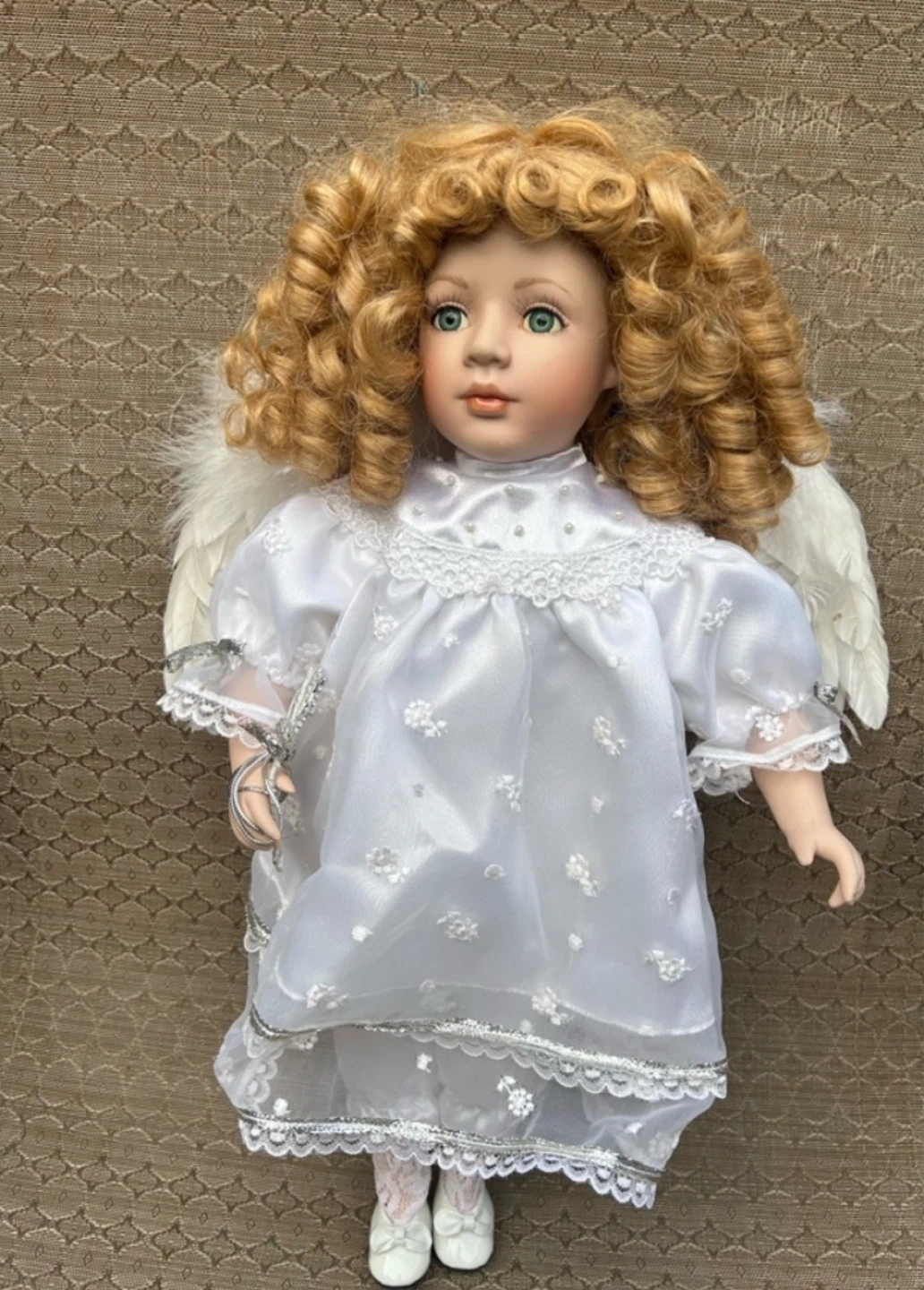 Porcelain Angel Doll with Feather Wings