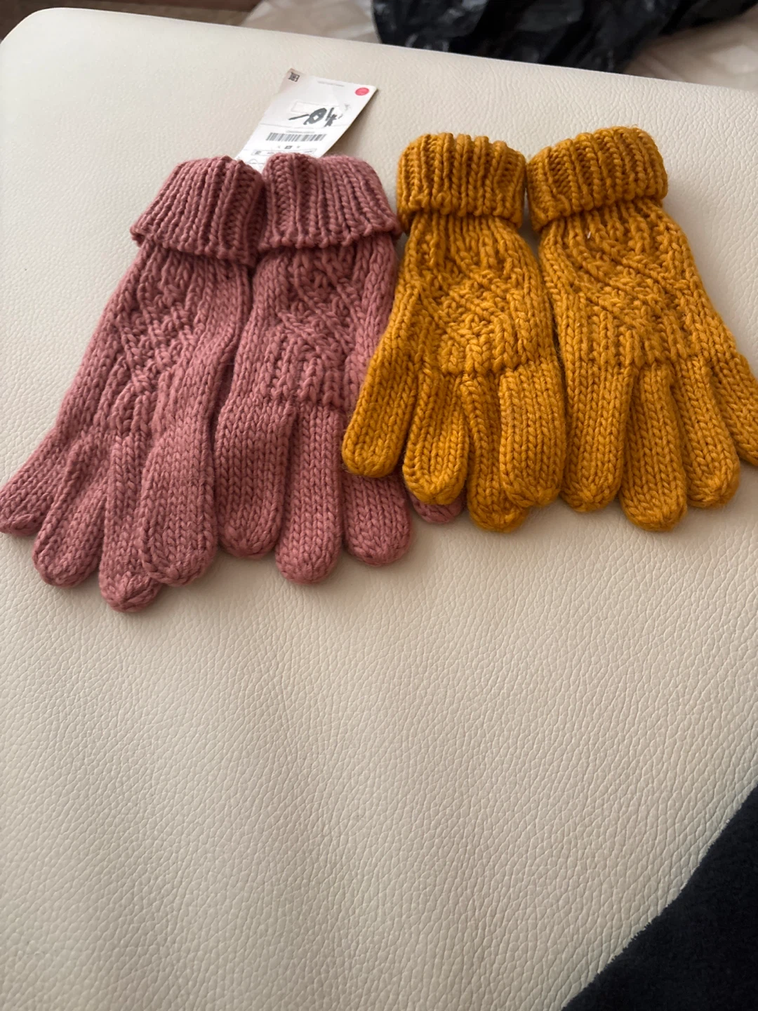 Two pairs of knit gloves
