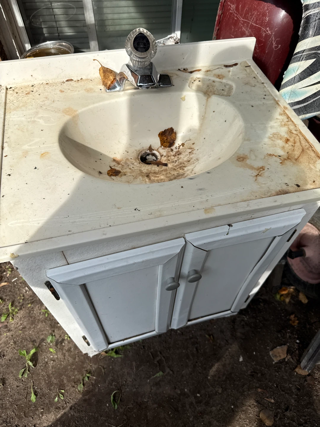 Bathroom vanity with sink and faucet