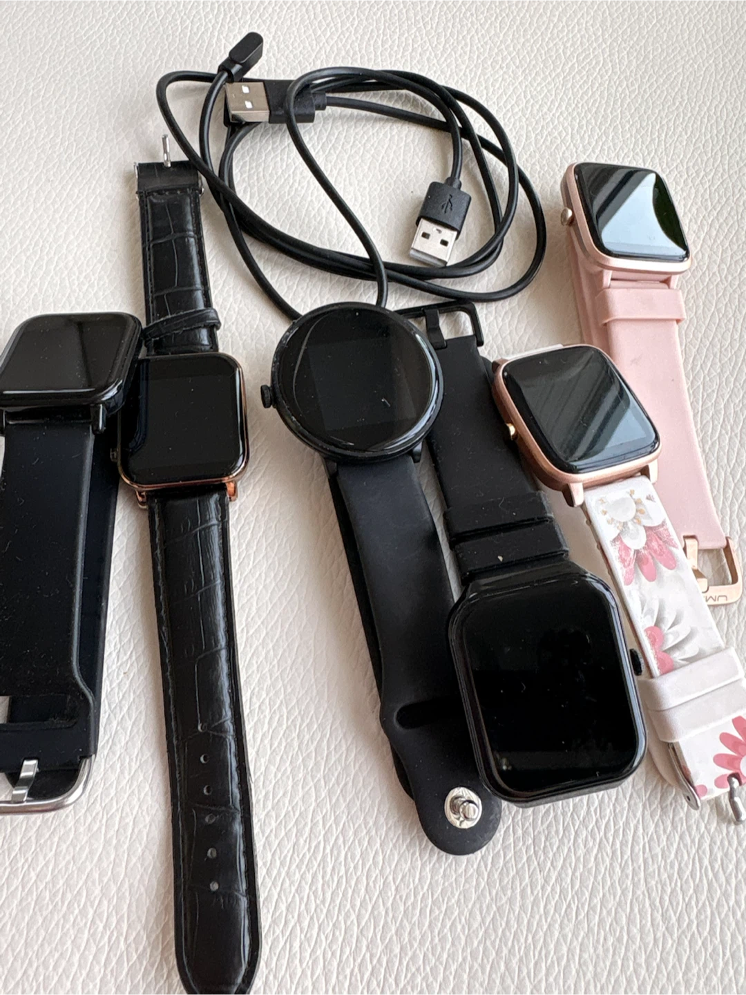 Assorted Smartwatches and Charging Cable - photo 2