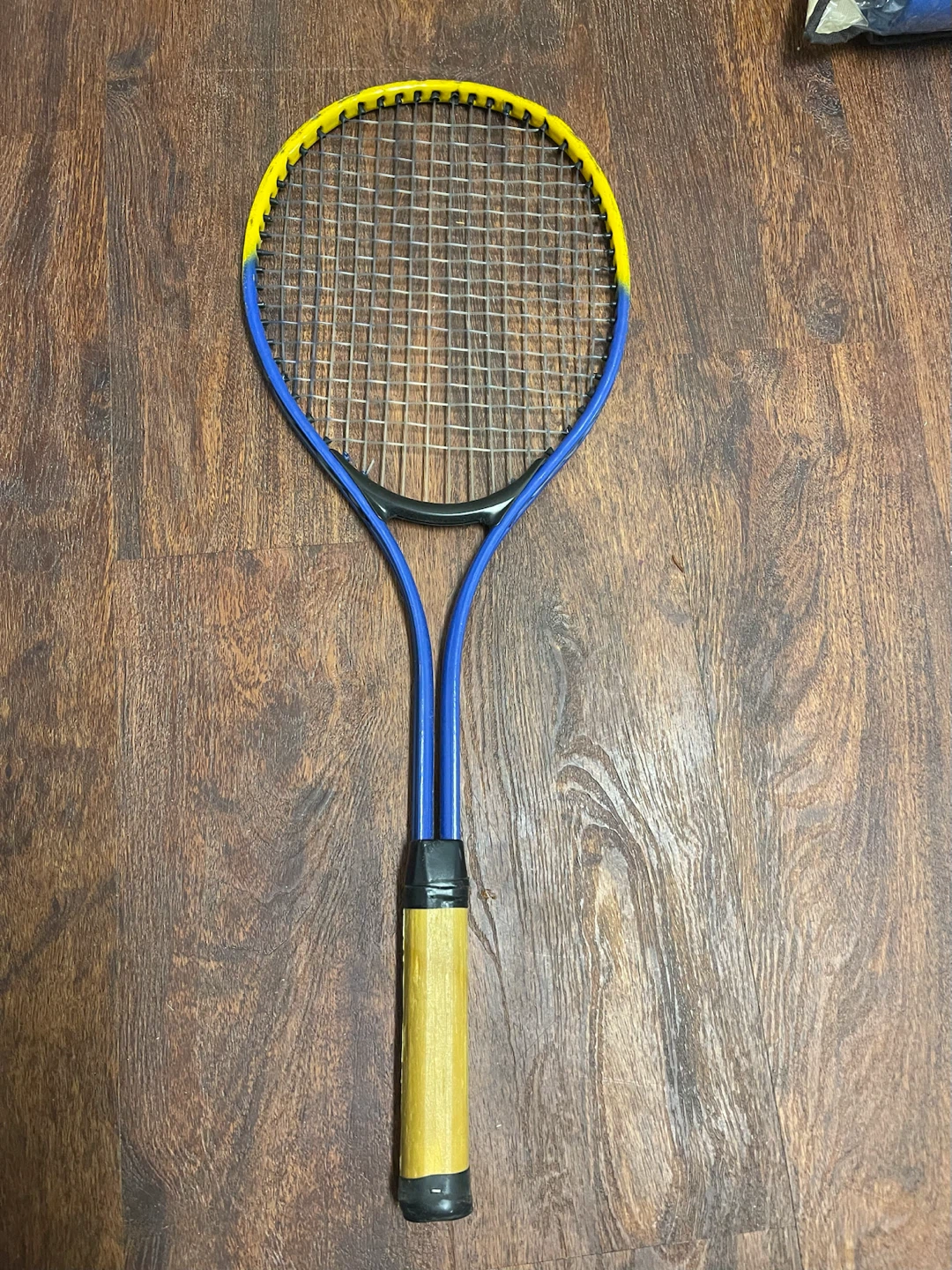 Blue and Yellow Tennis Racquet