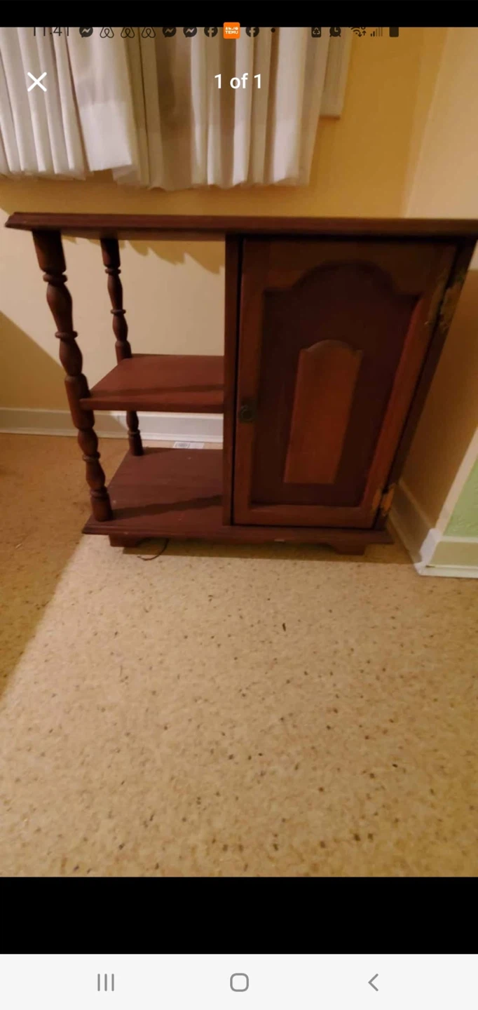 Wooden end table with cabinet and shelves