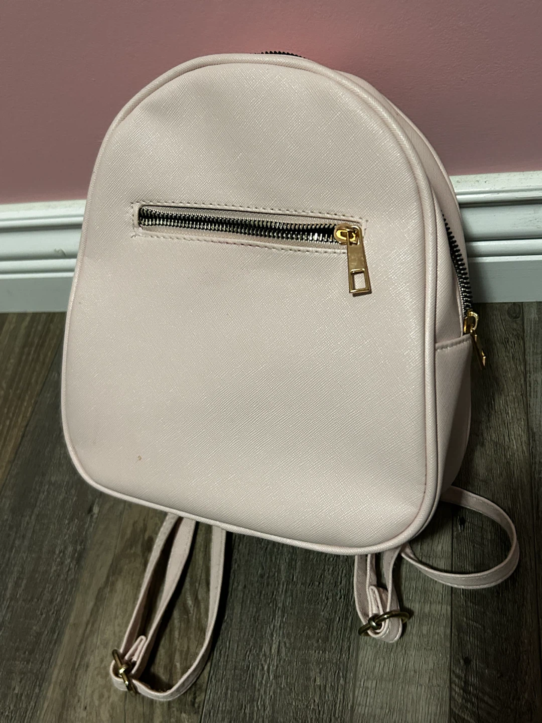 Light pink faux leather mini backpack