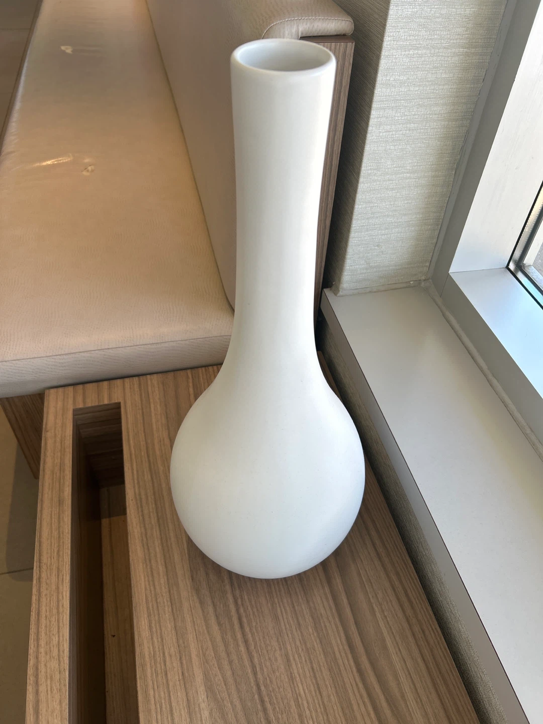 Minimalist white tall ceramic vase
