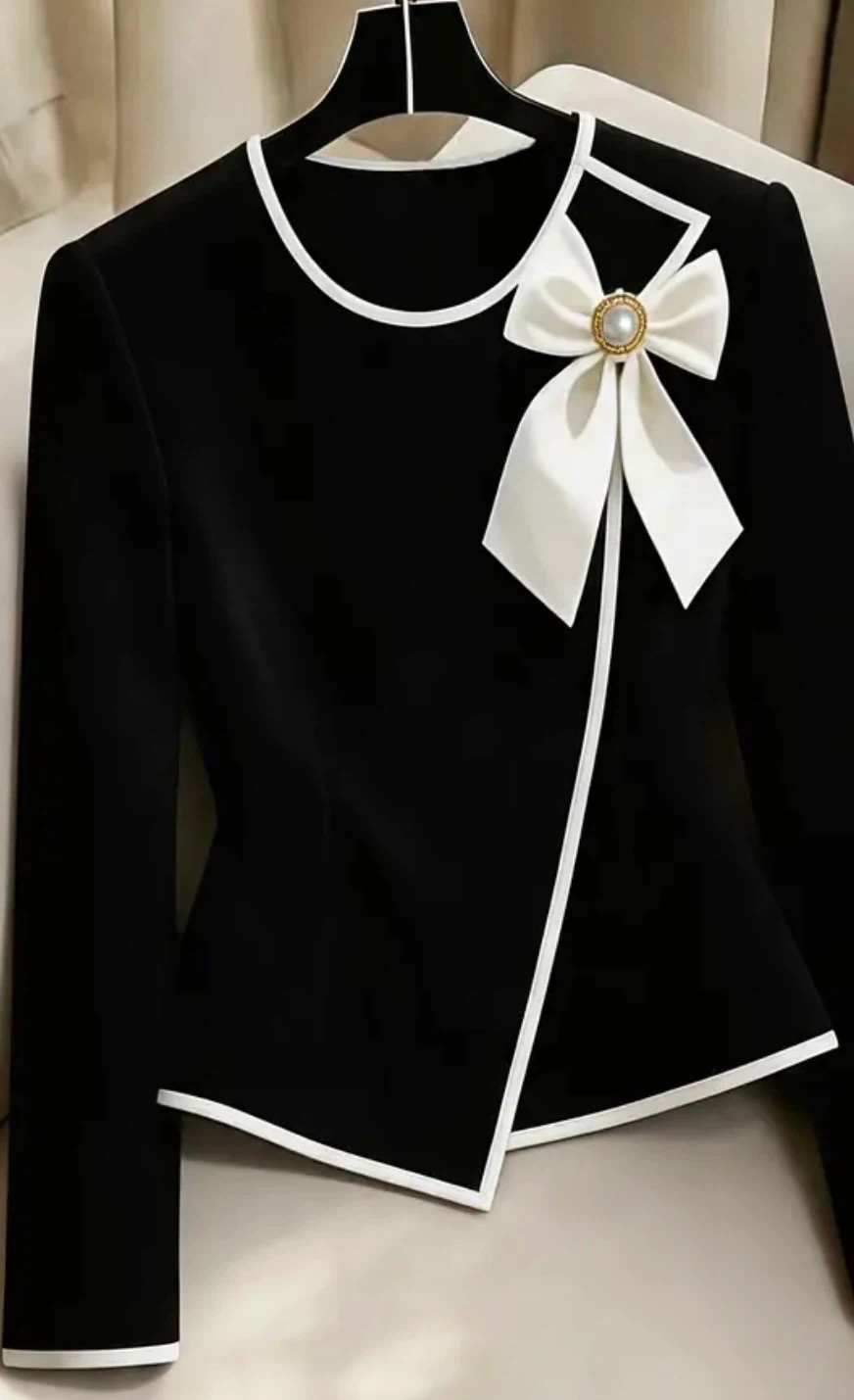 Black and white bow detail blouse