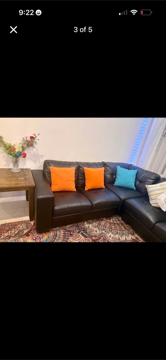 Black Sectional Sofa and Side Table