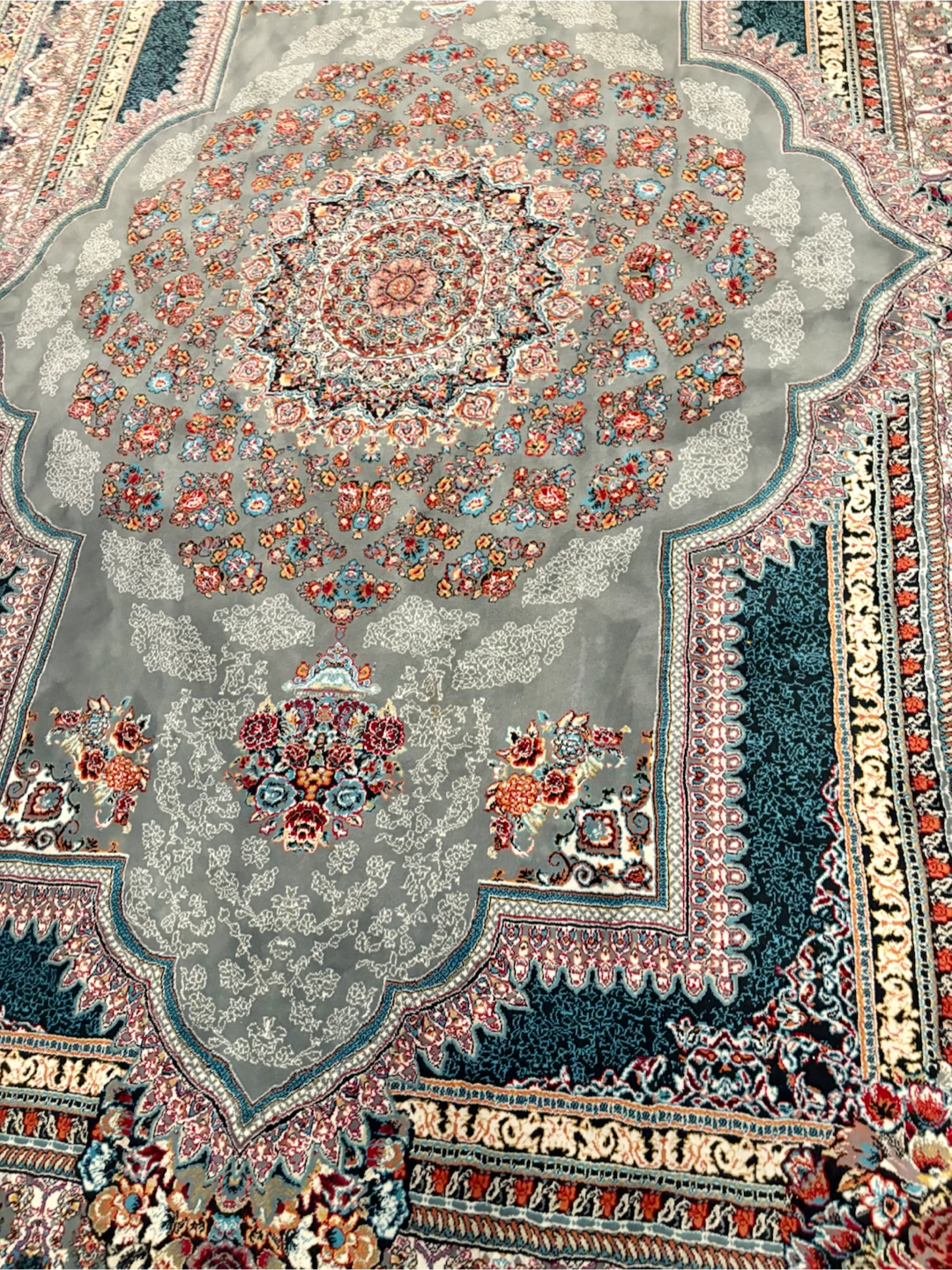 Large Persian-style decorative area rug