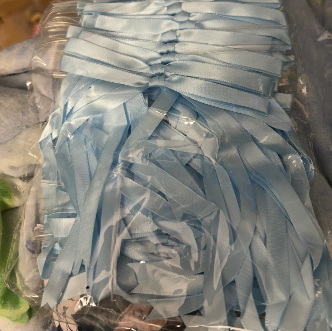 Light blue satin ribbon bows
