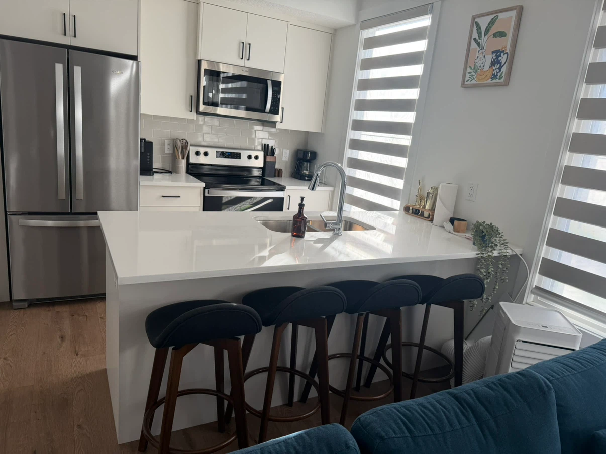 Set of four dark grey bar stools