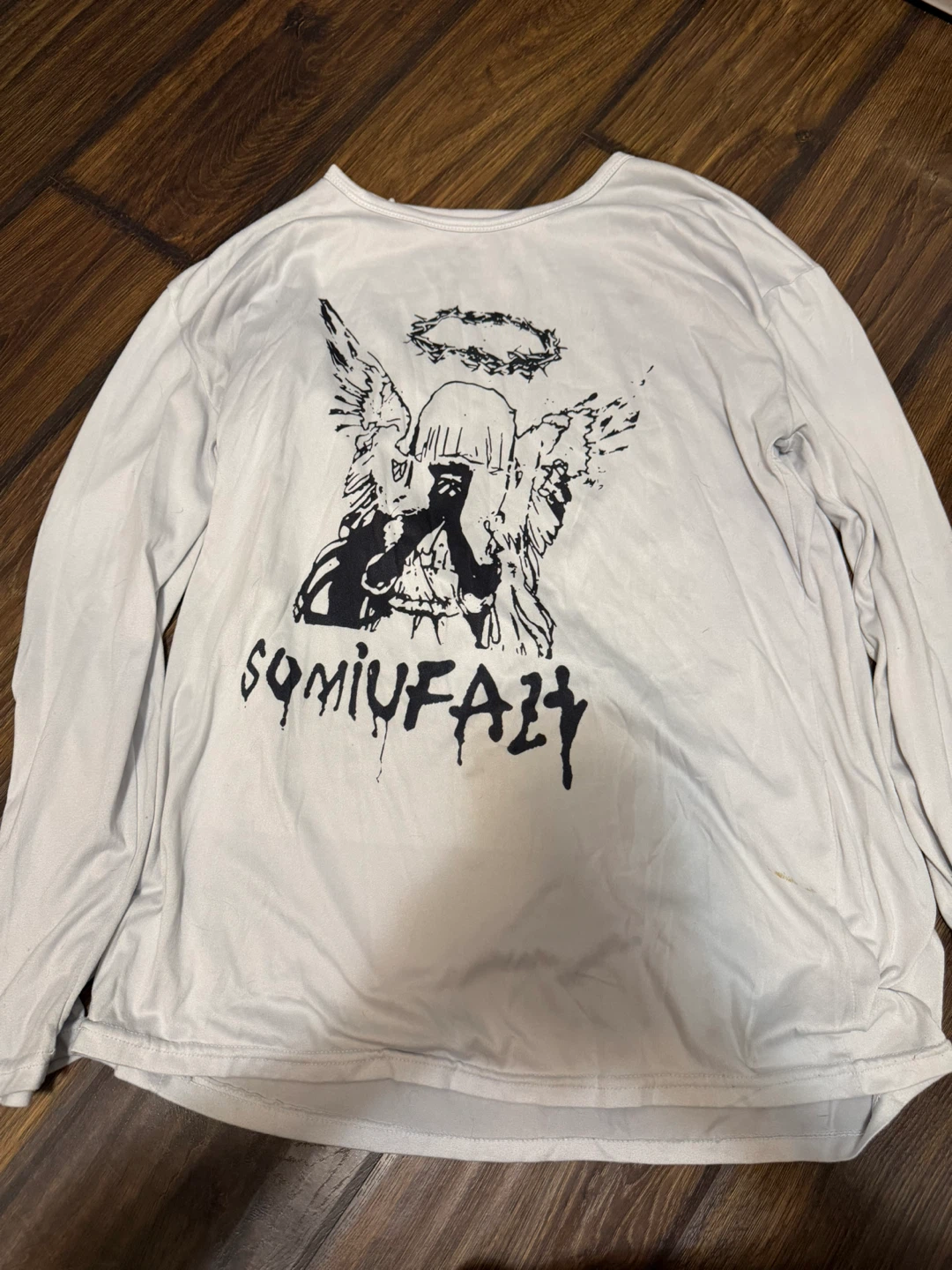 White long-sleeve graphic top