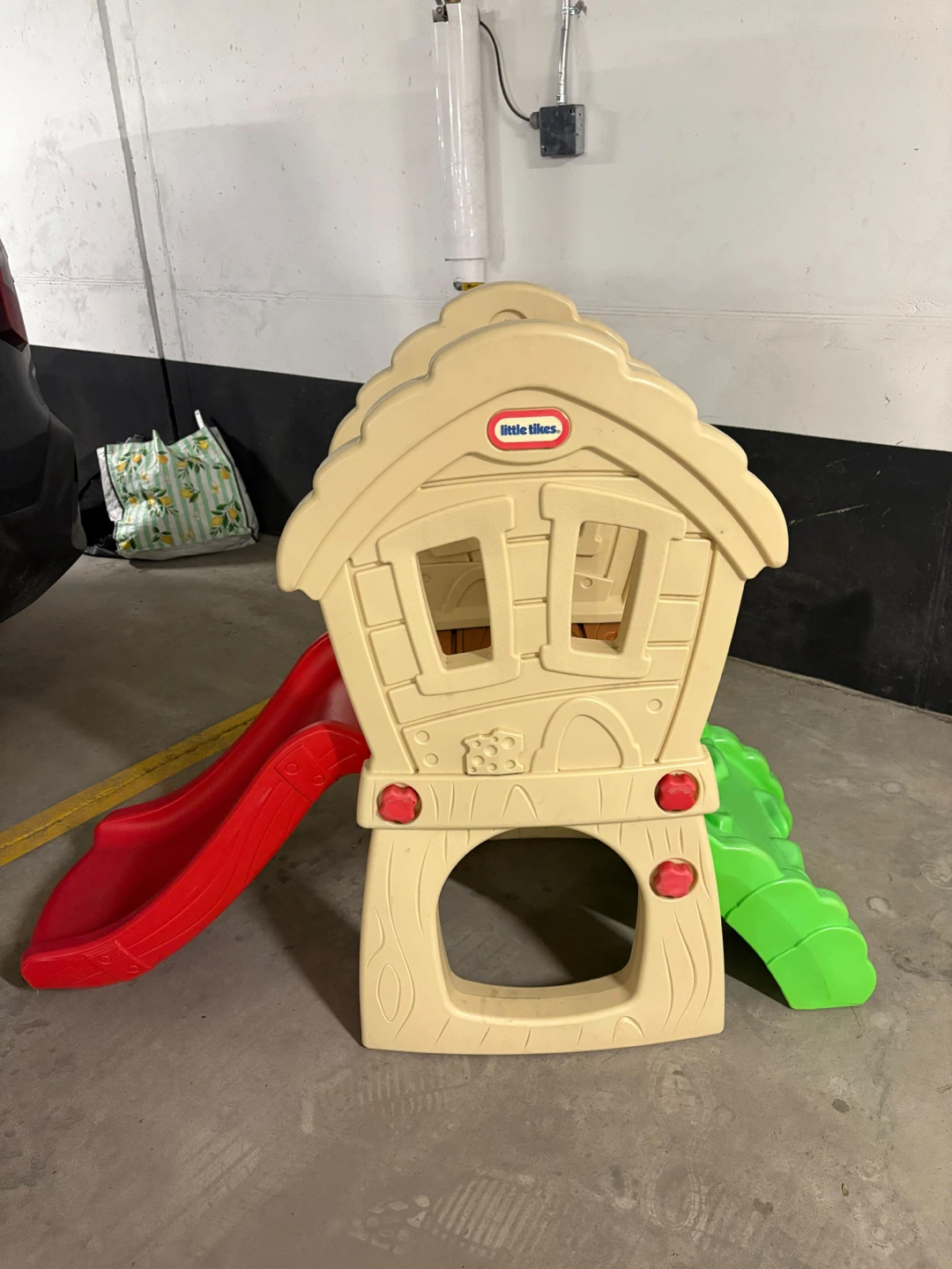 Toddlers play slide
