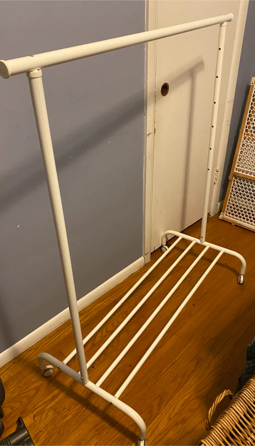 White metal clothing garment rack