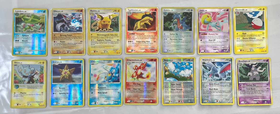 HP/DMG Lot of 14 Assorted Pokemon Trading Cards