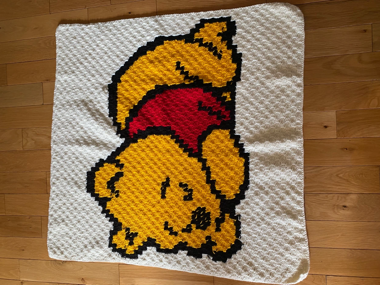 Hand-crocheted Winnie the Pooh baby blanket