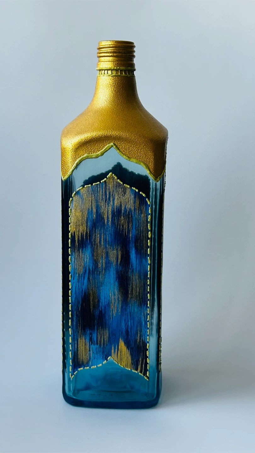 Decorative Hand-Painted Blue and Gold Glass Bottle