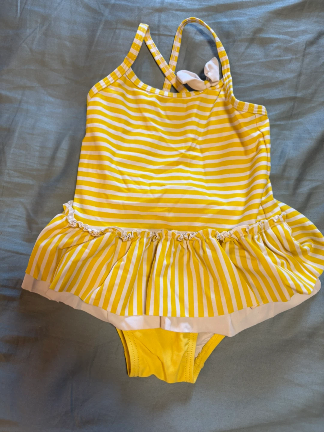 Yellow and white striped toddler swimsuit