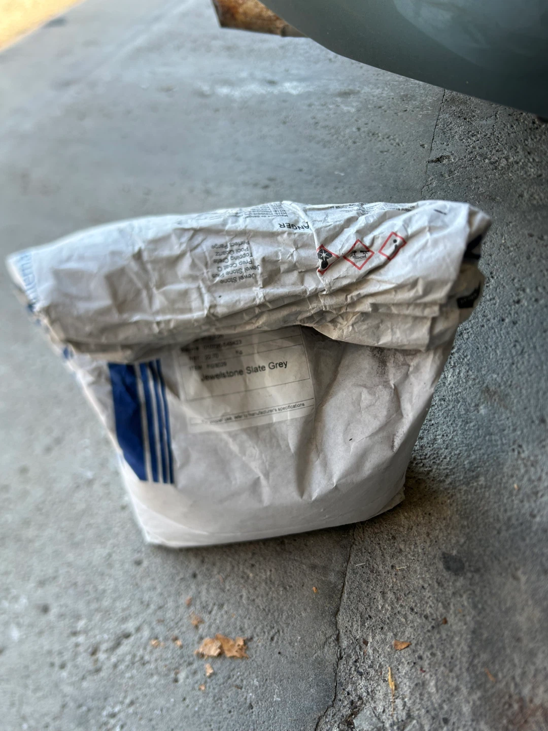 Cement surfacing material