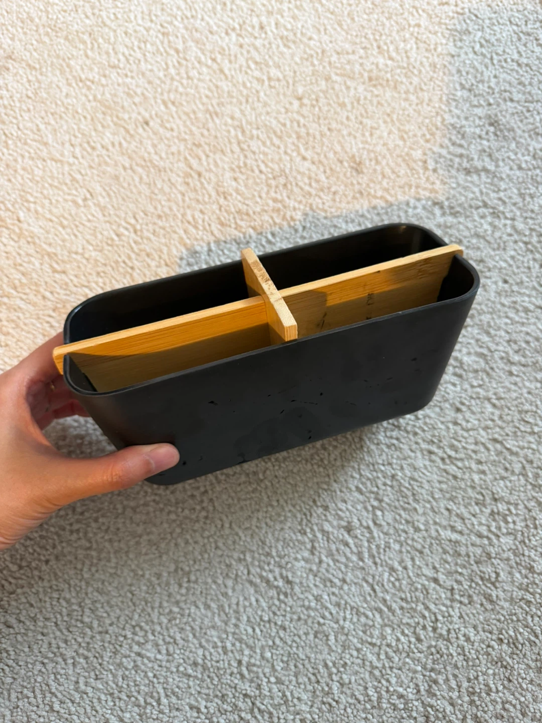 Black desktop organizer with bamboo dividers