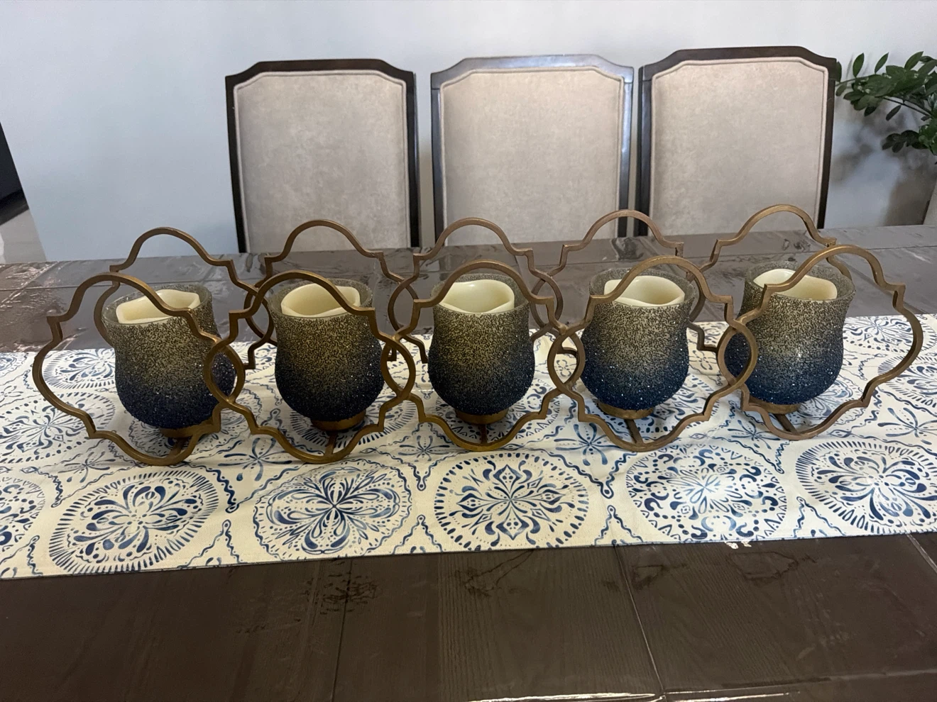 Five-piece metal and glass candle holder set